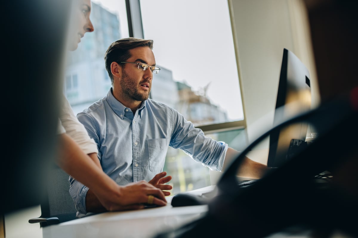 working colleagues discuss figures